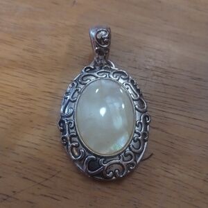 Elegant Pendant with Cream Stone